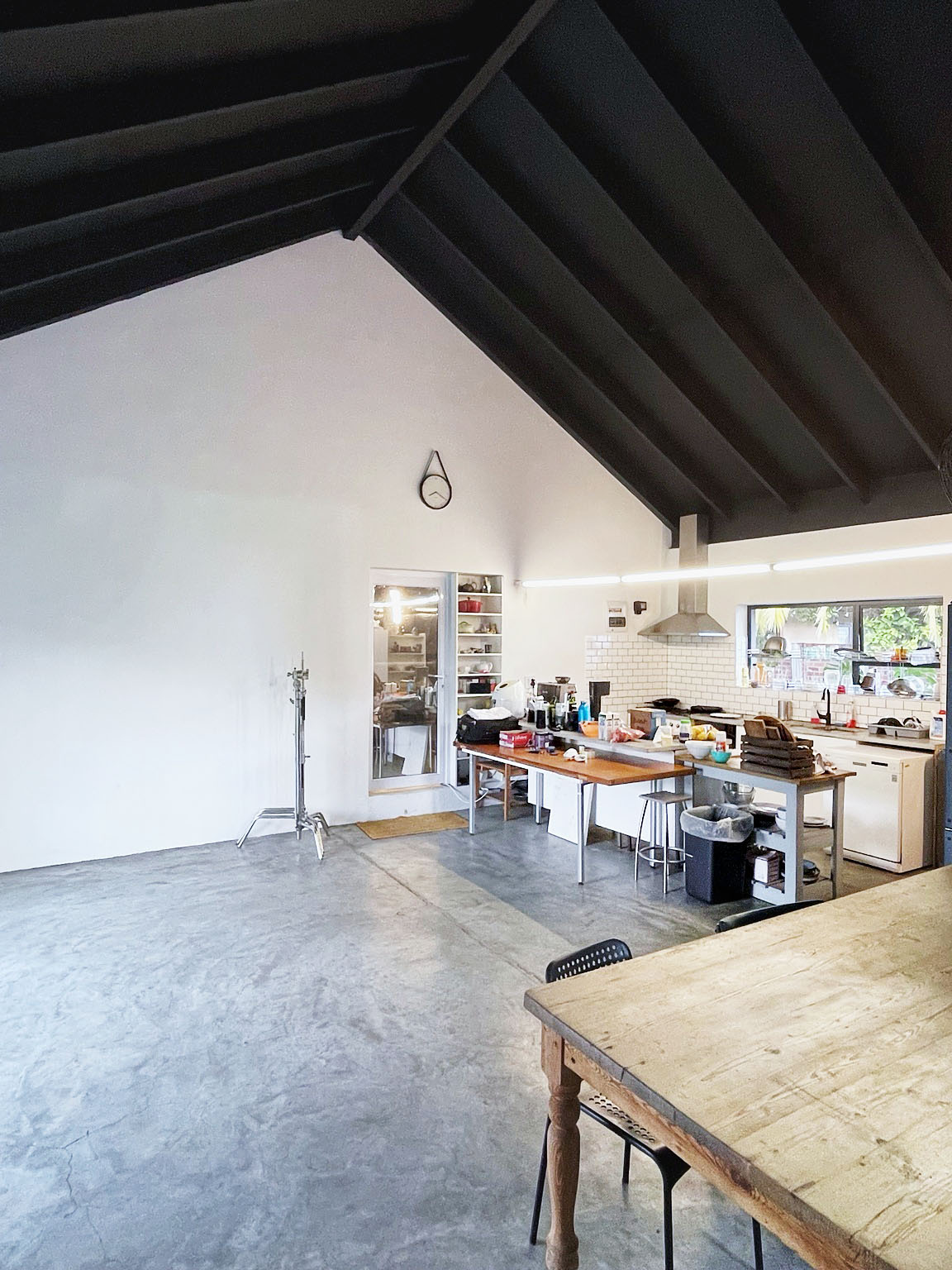 89 Forest Drive Studio interior with kitchen in the distance